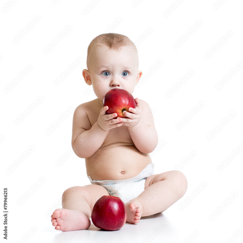 Baby boy eating apple, isolated on white Baby boy eating apple, isolated on white