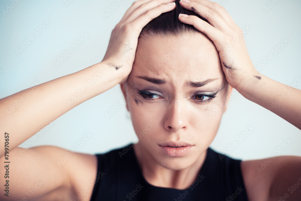 Fototapeta premium The woman with the spoiled make-up