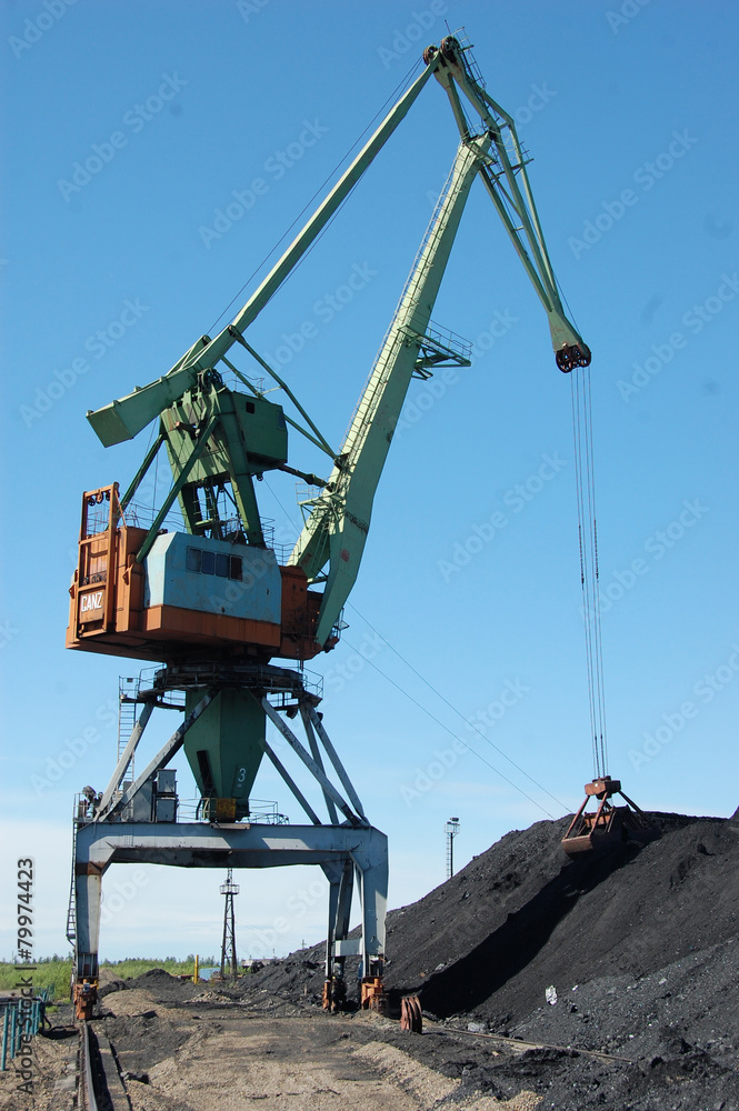 River port cargo crane loading coal River port cargo crane loading coal