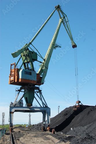River port cargo crane loading coal