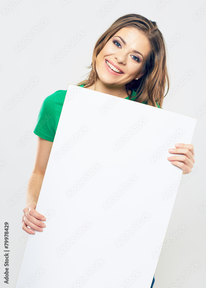 smiling woman hold white banner. isolated portrait. smiling woman hold white banner. isolated portrait.