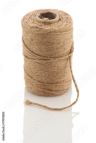 Roll of twine cord on a white background