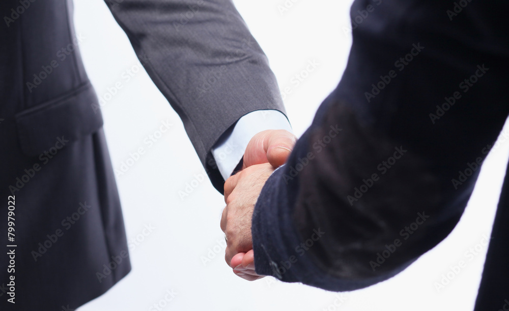 Closeup of a business handshake, on white background