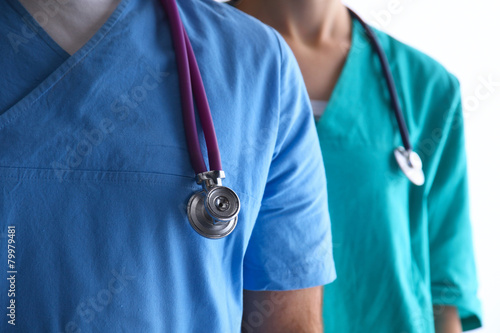 Closeup portrait of a two  doctors with stethoscope © lenetsnikolai