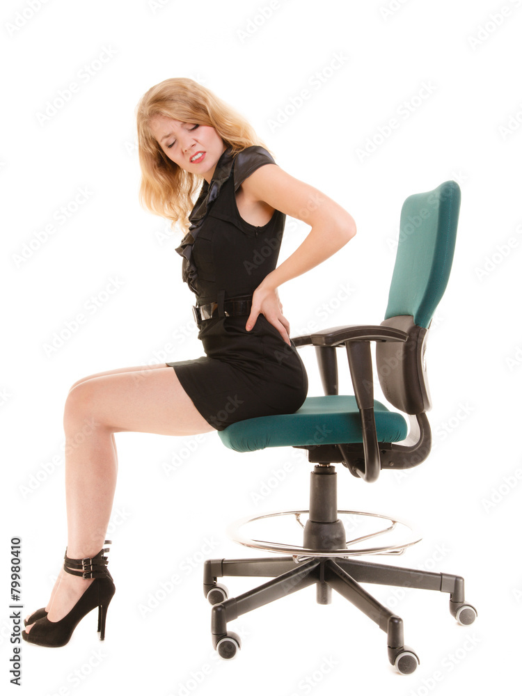 Young business woman with backache back pain.