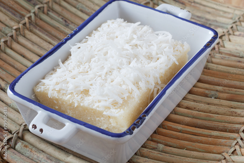 Brazilian sweet cuoscous (cuscuz doce) with coconut ion plate Brazilian sweet cuoscous (cuscuz doce) with coconut ion plate