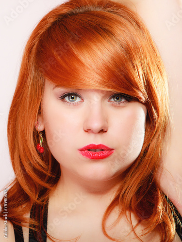 Portrait beautiful young redhaired woman