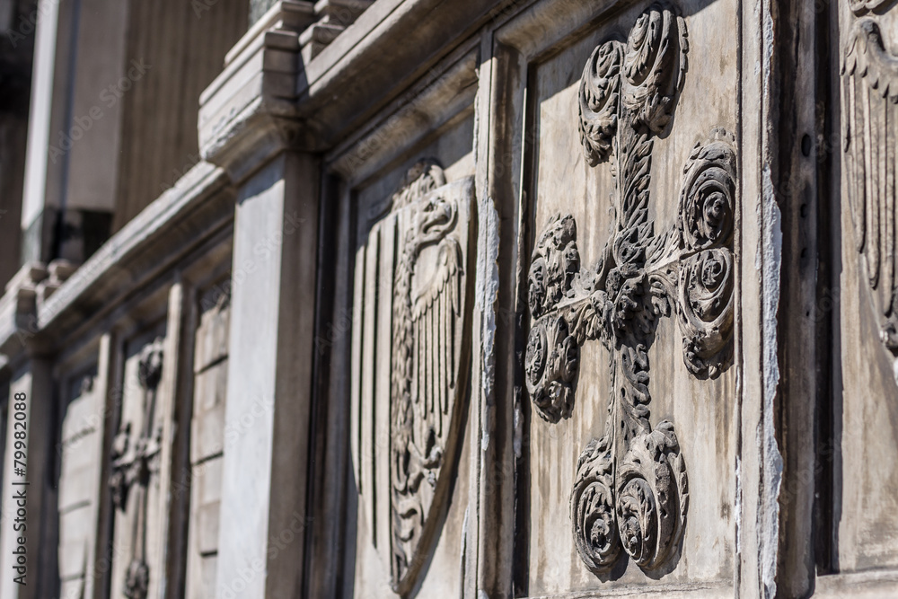 Decorative cross - architectural detail on facade of basilica