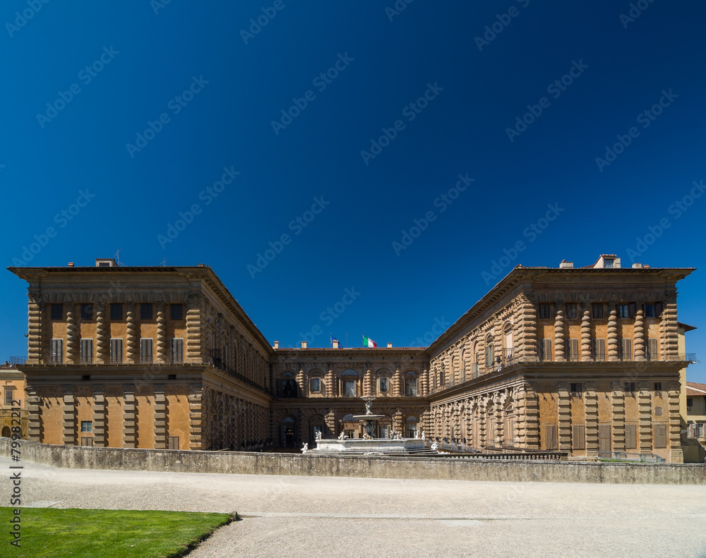 Facade of Pitti Palace with fountain and Boboli Gardens