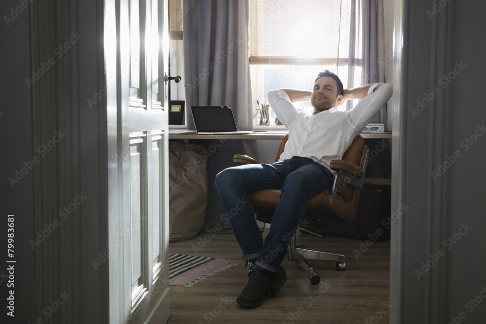 Man having a break at his home office Man having a break at his home office