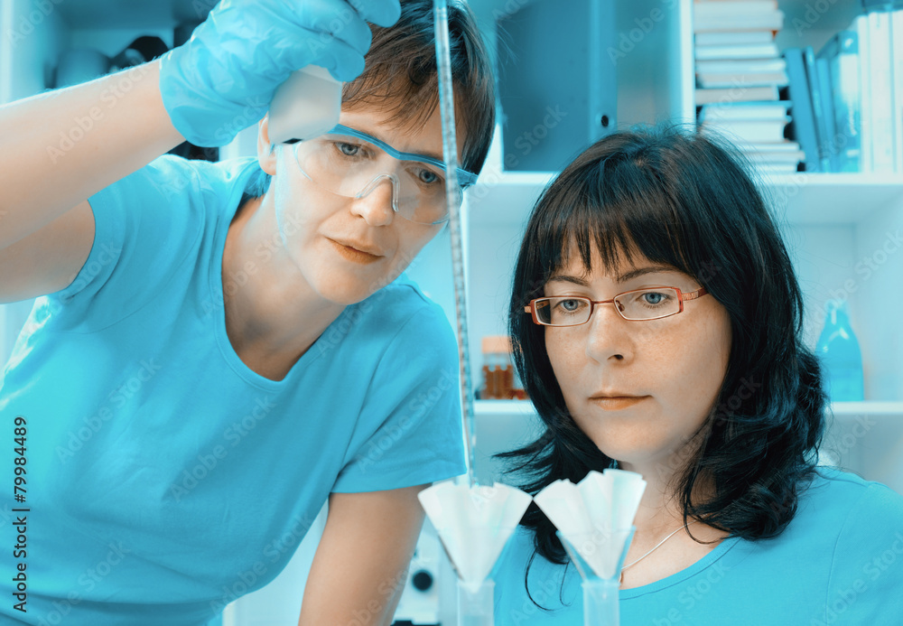 Two scientists at work Two scientists at work