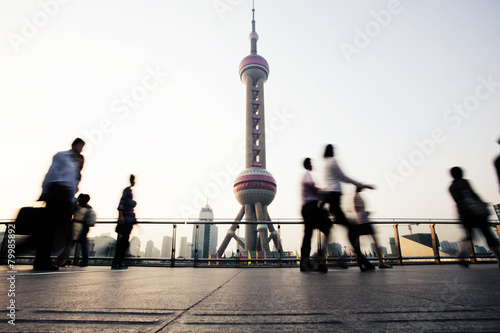 landmark and walking people in Shanghai.