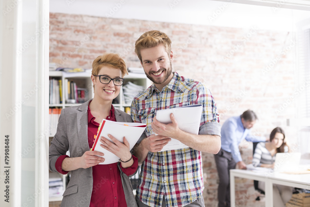 Portrait of two confident young colleagues in office Portrait of two confident young colleagues in office