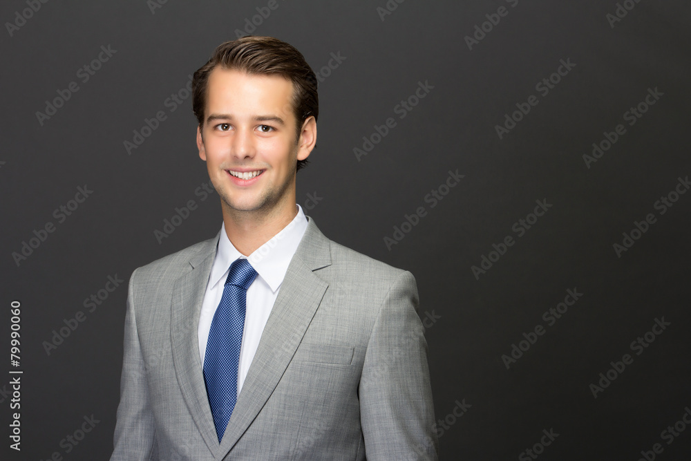 A charming young man on a suit A charming young man on a suit