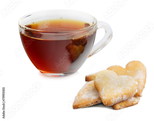 Isolated glass cup tea with heart shaped cookies