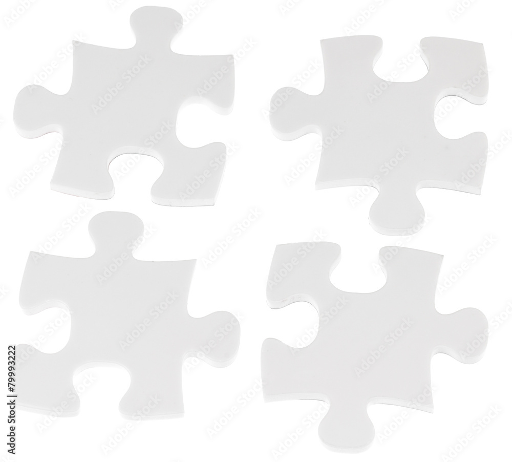quatre pièces de puzzle sur fond blanc quatre pièces de puzzle sur fond blanc