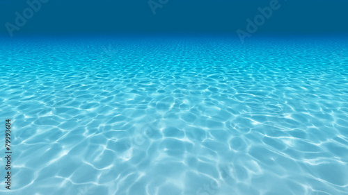 Sandy bottom, blue and surface underwater
