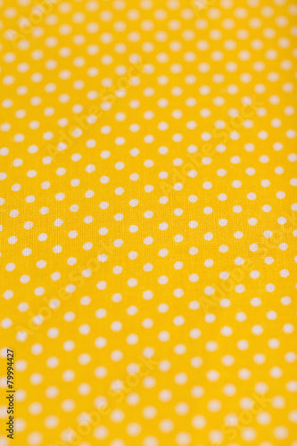 yellow cotton fabric with white polka dots