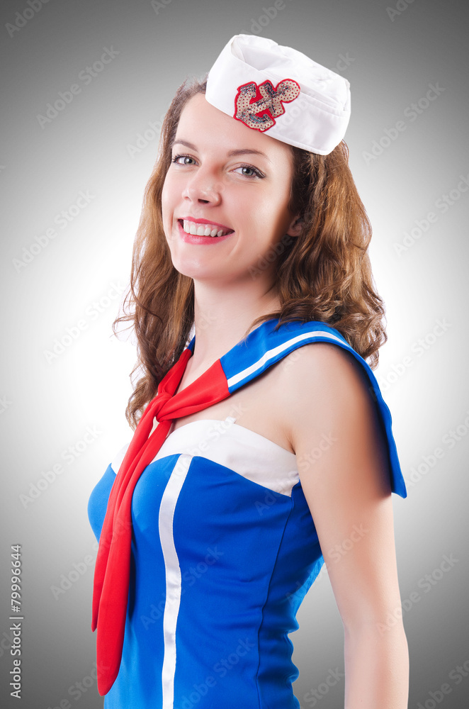 Young woman sailor in marine concept