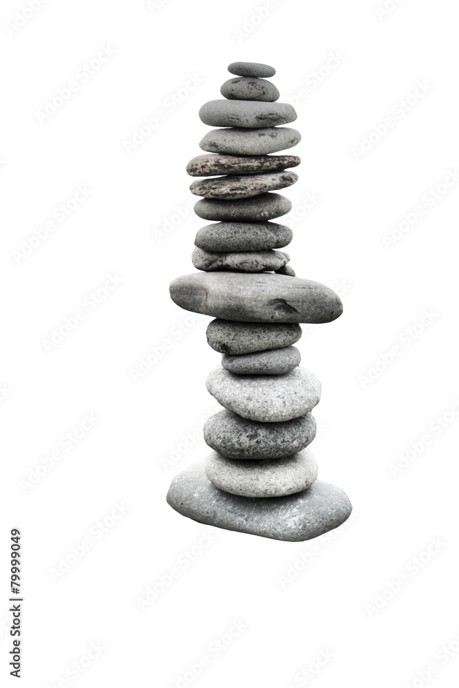 stones balancing on top of each to make a tower on a beach stones balancing on top of each to make a tower on a beach