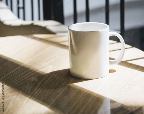 Coffee cup on table photo