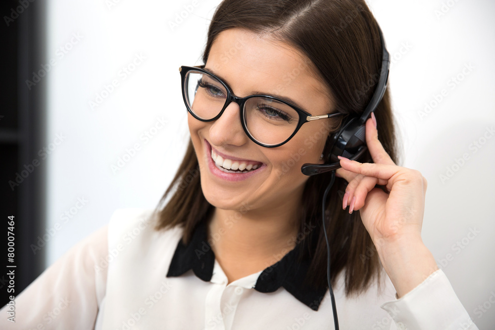 Cheerful female support operator in headset Cheerful female support operator in headset
