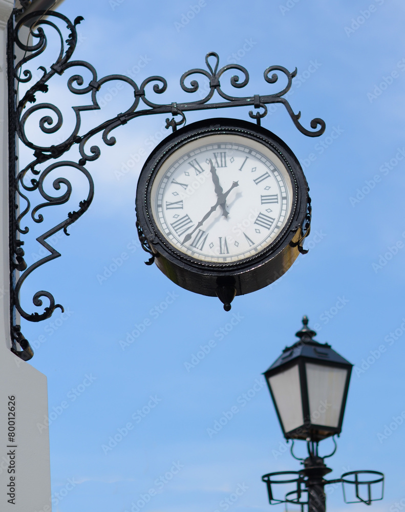 The town clock and street lamp