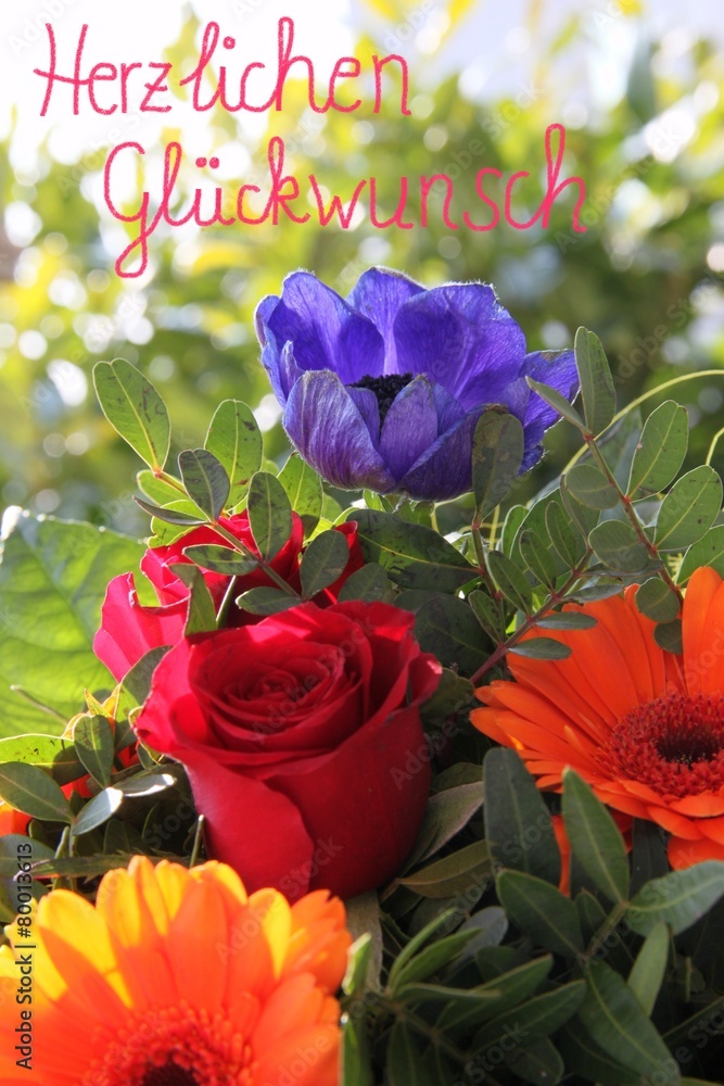 Herzlichen Glückwunsch mit frischen Blumen StockFoto Adobe Stock