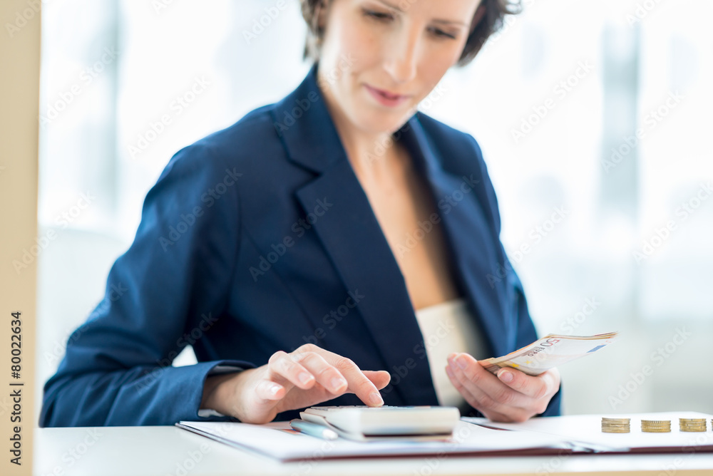 Young female bank officer at work Young female bank officer at work