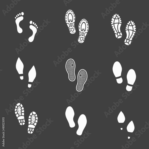 Set of footprints and shoeprints icons showing bare feet