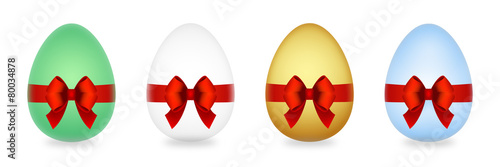 Easter eggs with red bow isolated on white