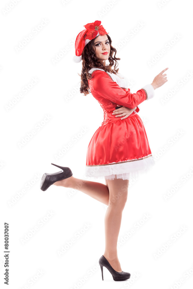 Beautiful and sexy woman wearing santa clause costume isolated Beautiful and sexy woman wearing santa clause costume isolated