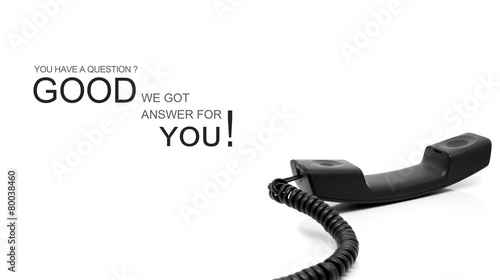Inspirational quote and telephone handset isolated on white.