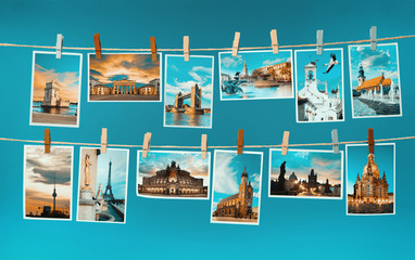 Pictures of european landmarks pinned on ropes, toned image