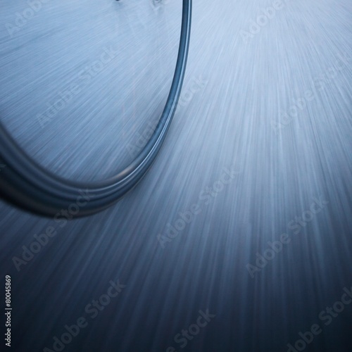 bicycle wheel in motion blur photo