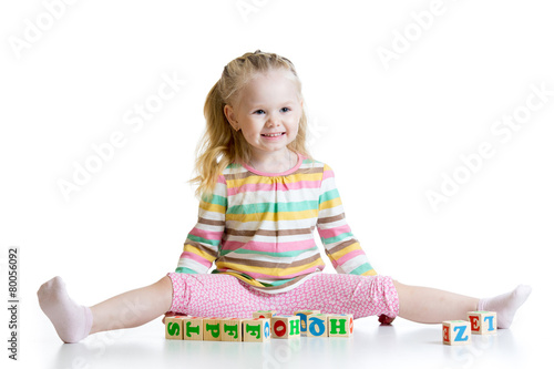child girl playing on floor...