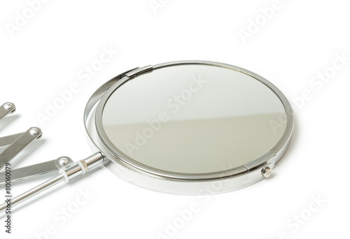 Cosmetic magnifying mirror isolated on white