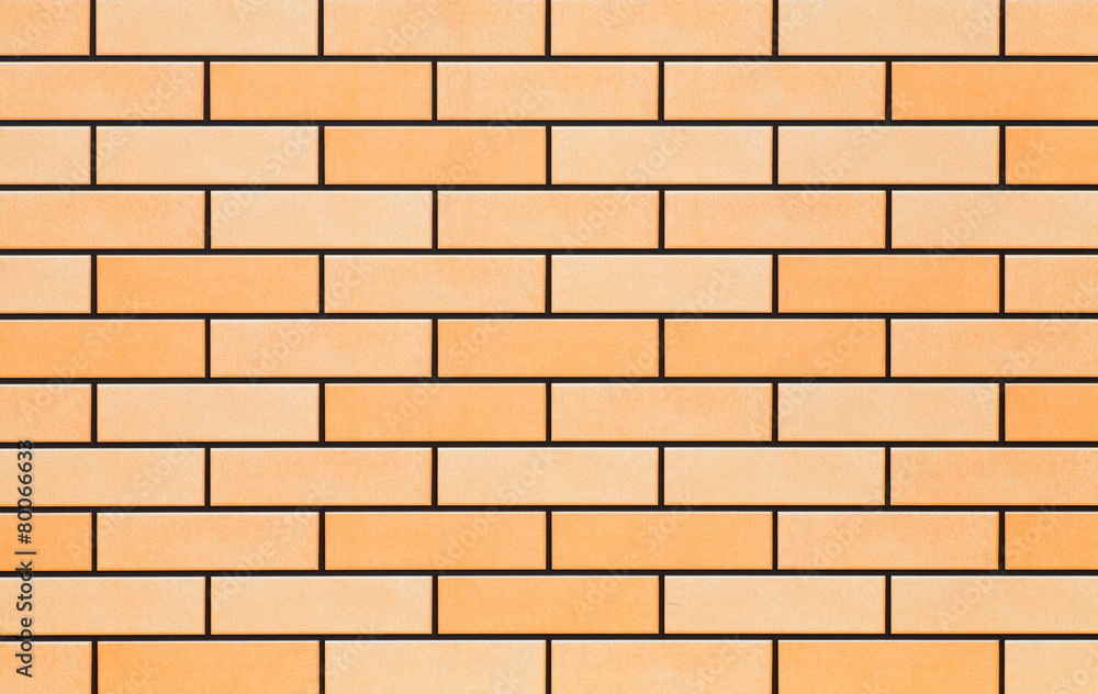 The modern yellow concrete tile wall background . The modern yellow concrete tile wall background .