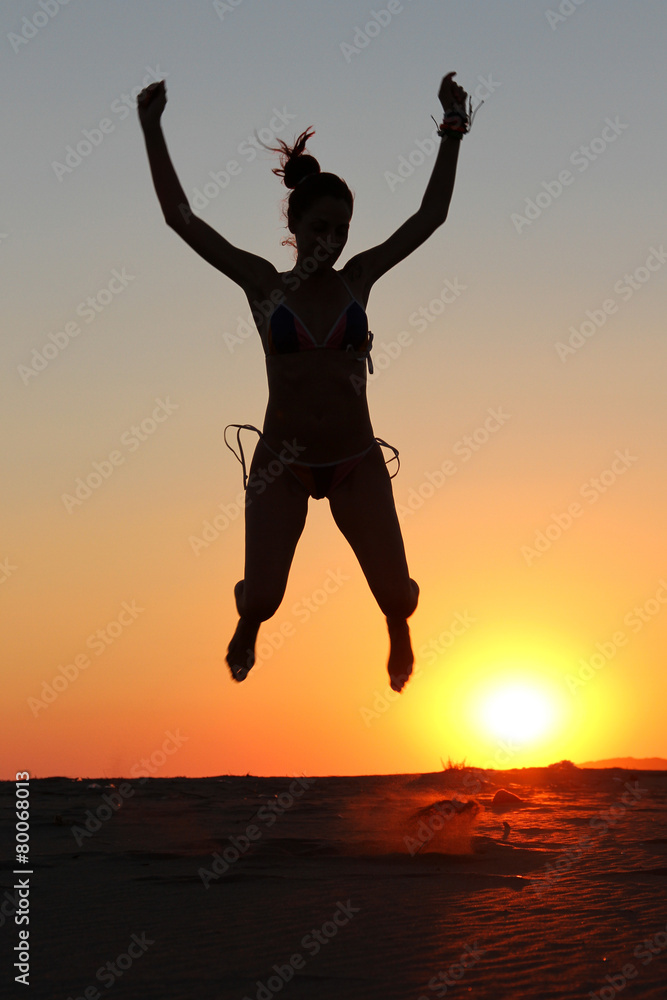 Girl silhouette jumping