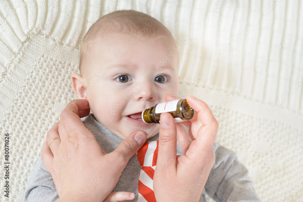 Newborn baby gets medicine Newborn baby gets medicine
