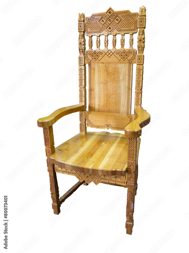 Fototapeta premium Vintage carved wooden chair isolated over white