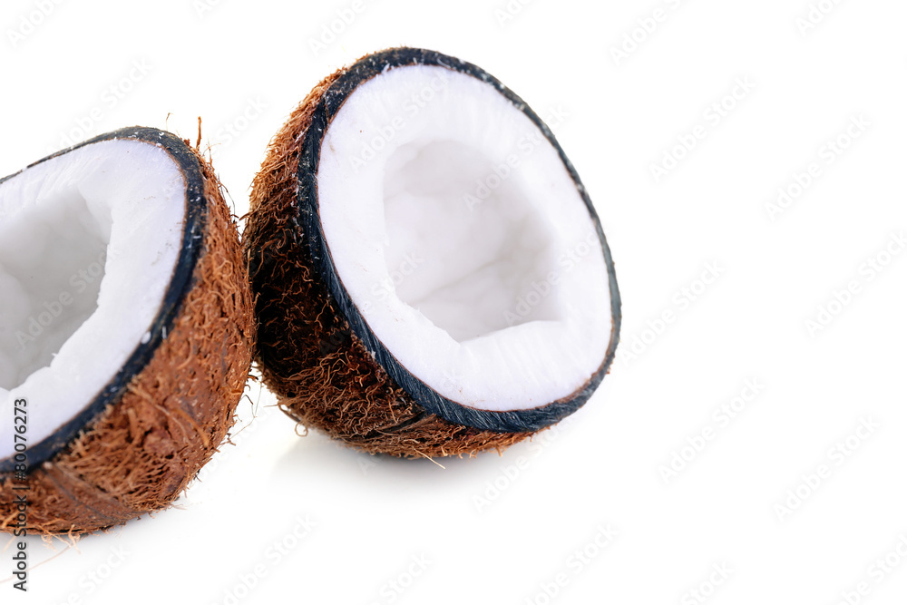 Coconut cut in half isolated on white background Coconut cut in half isolated on white background