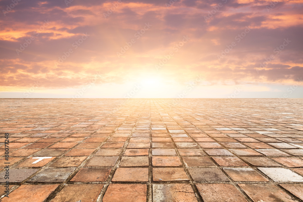 By bricks tiles in sunset