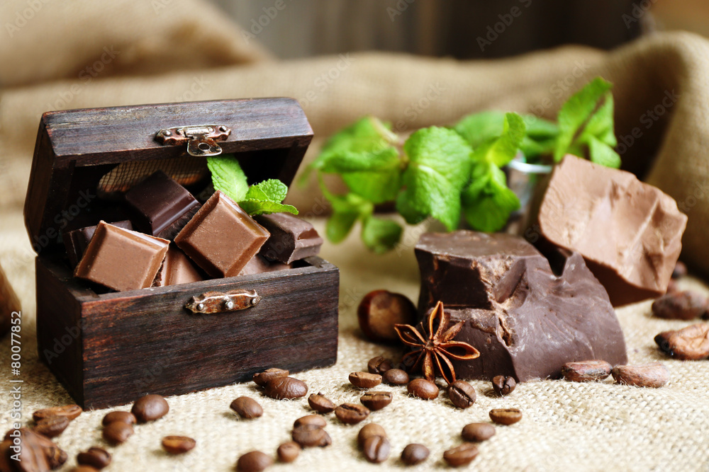 Still life with set of chocolate on burlap cloth, closeup Still life with set of chocolate on burlap cloth, closeup