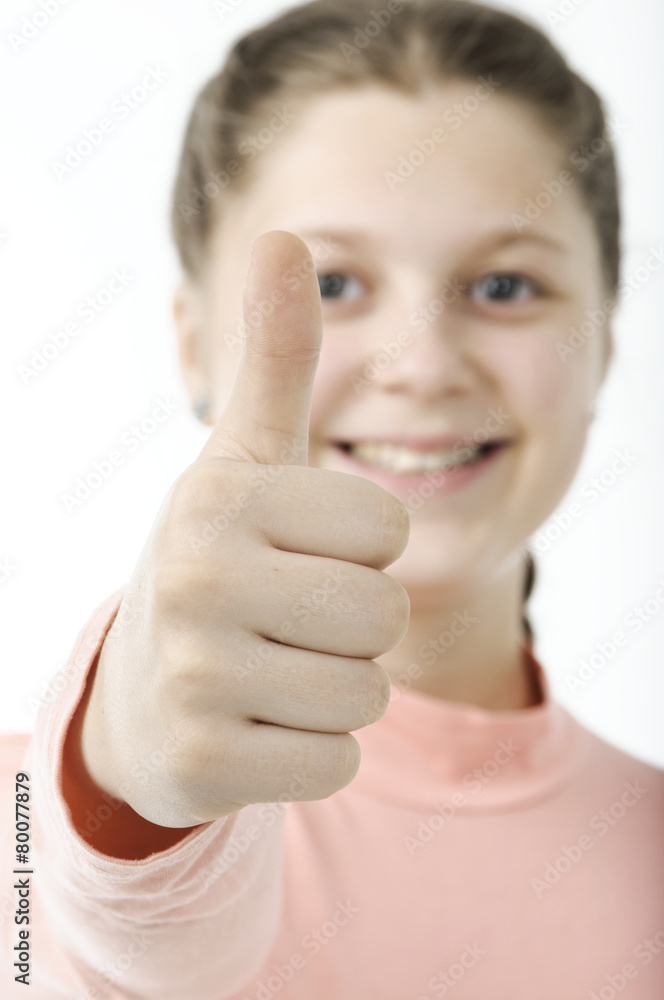 Portrait of pretty little girl showing thumb Portrait of pretty little girl showing thumb