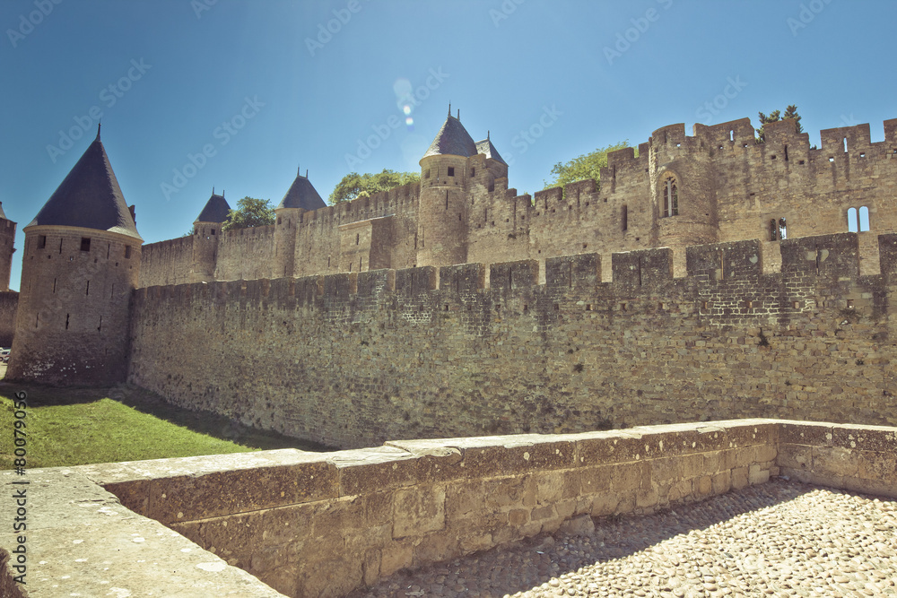 Stone wall of an ancient castle in France