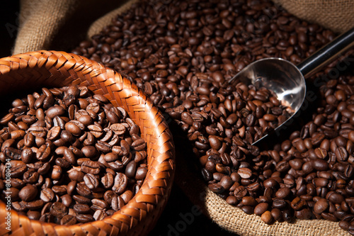 roasted coffee beans in a bamboo basket