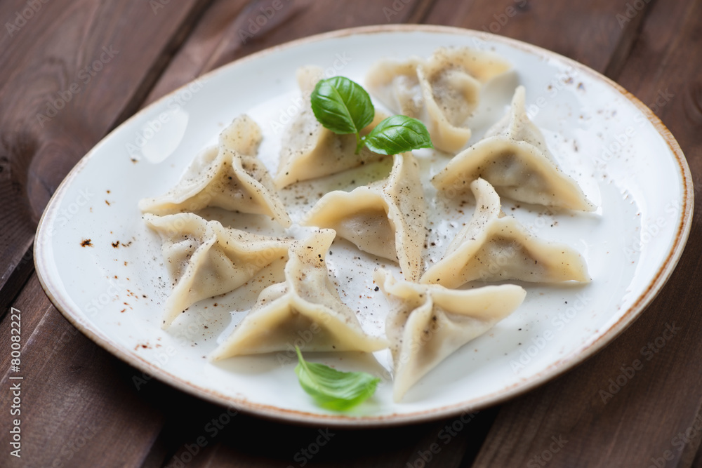Khinkali or eastern style meat dumplings, studio shot, close-up Khinkali or eastern style meat dumplings, studio shot, close-up