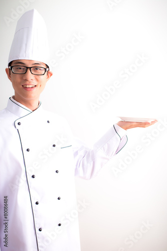 portrait of caucasian chef on white