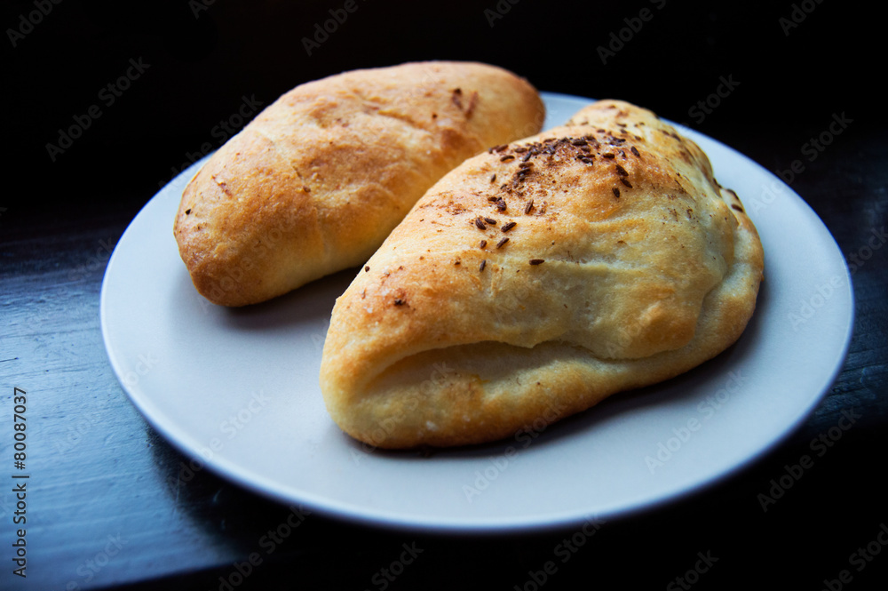 Pair of salt cakes on dark background Pair of salt cakes on dark background